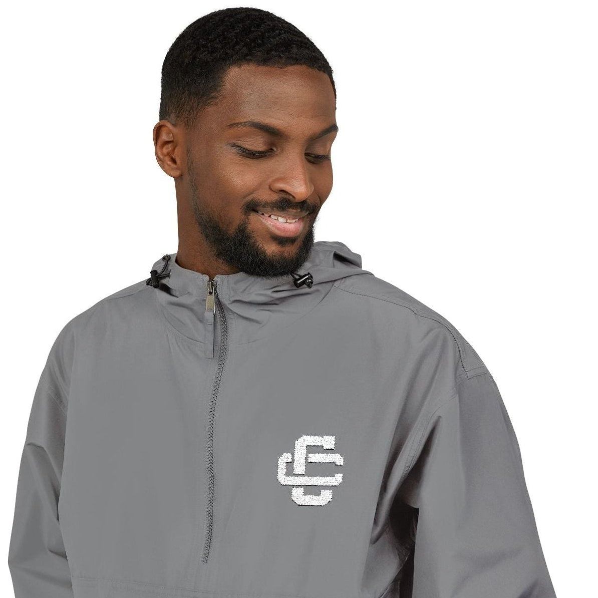 Man wearing a gray hoodie with 'Culture Creators' text on a white background