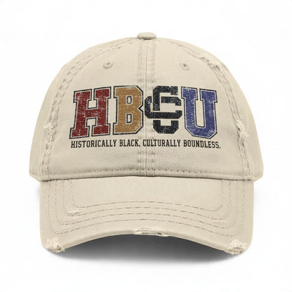 Creators Collection bone-colored distressed cotton cap featuring a multicolor HBCU collegiate wordmark on the front.