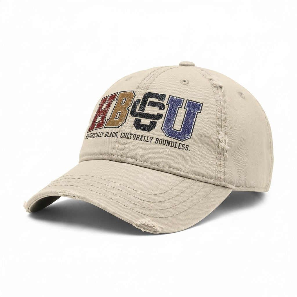 Creators Collection bone-colored distressed cotton cap with multicolor HBCU collegiate embroidery on the front.