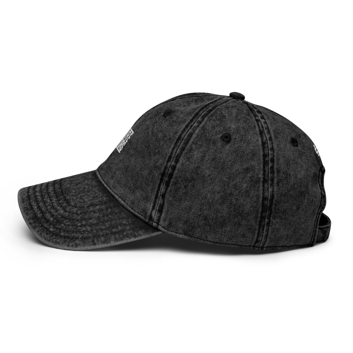Creators Collection vintage cotton twill dad cap in washed black with intricate embroidery and antique brass buckle