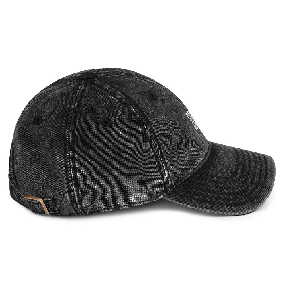 Creators Collection vintage cotton twill dad cap in washed black with antique brass buckle and unstructured design